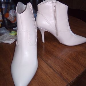 Ninewest booties... brand new. Never worn